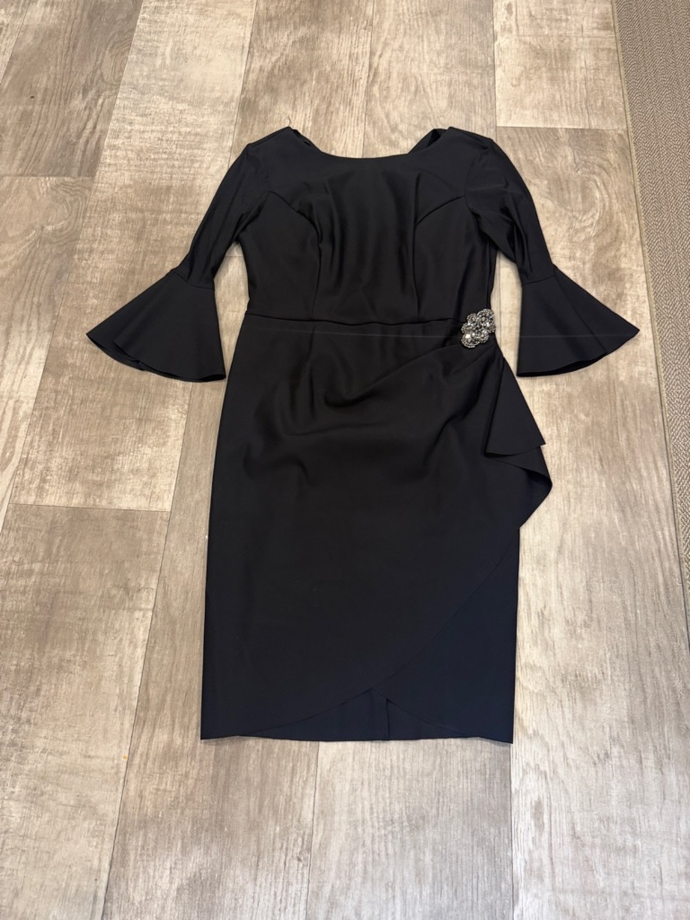 Alex Evenings Black Long Sleeve Sheath Dress with Ruffle Detail and Brooch